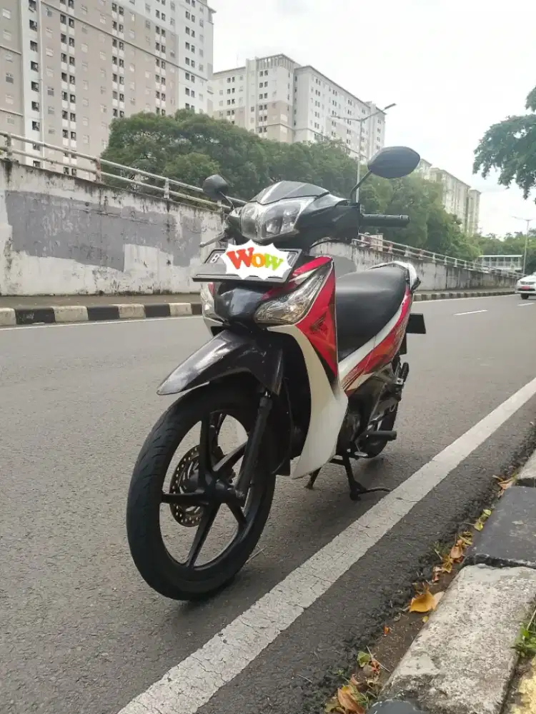 Honda supra x 125 helm in karbu 2011