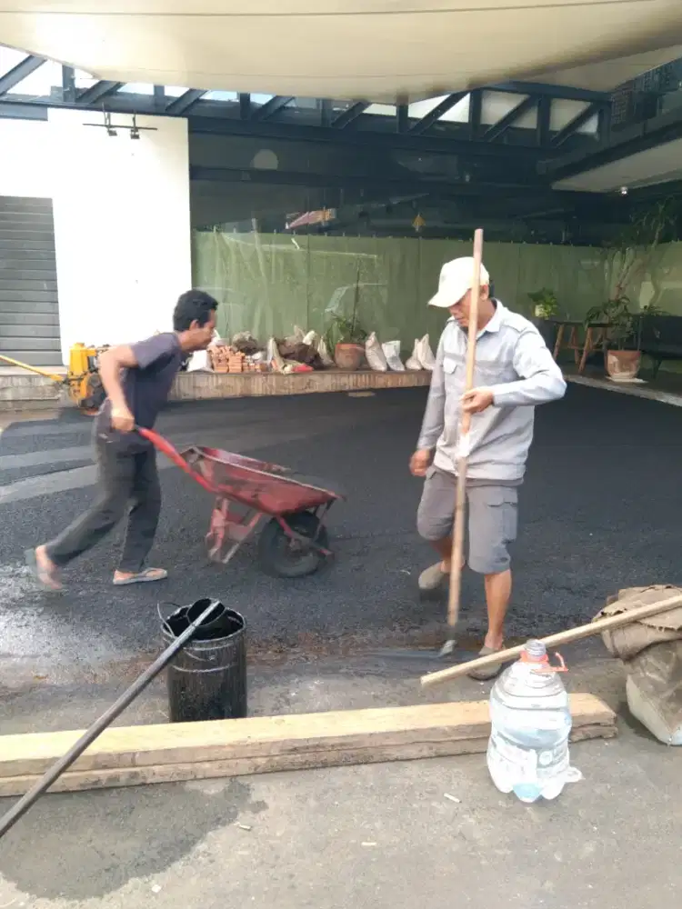 Aspal hotmix parkiran kemang