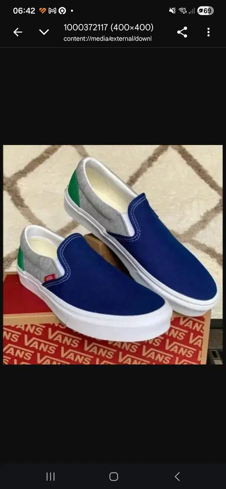 Classic Slip-On Coastal sneakers in a blue, grey, and green colorway