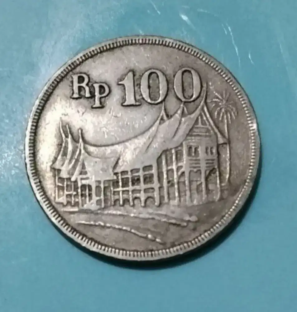 Koin Rp.100 rumah gadang 1973