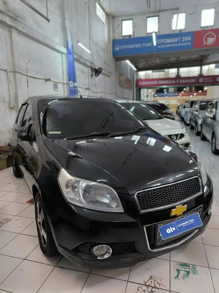 CHEVROLET 2008 AVEO 1.5 M/T HITAM MURAH OTOMART 286 KENJERAN