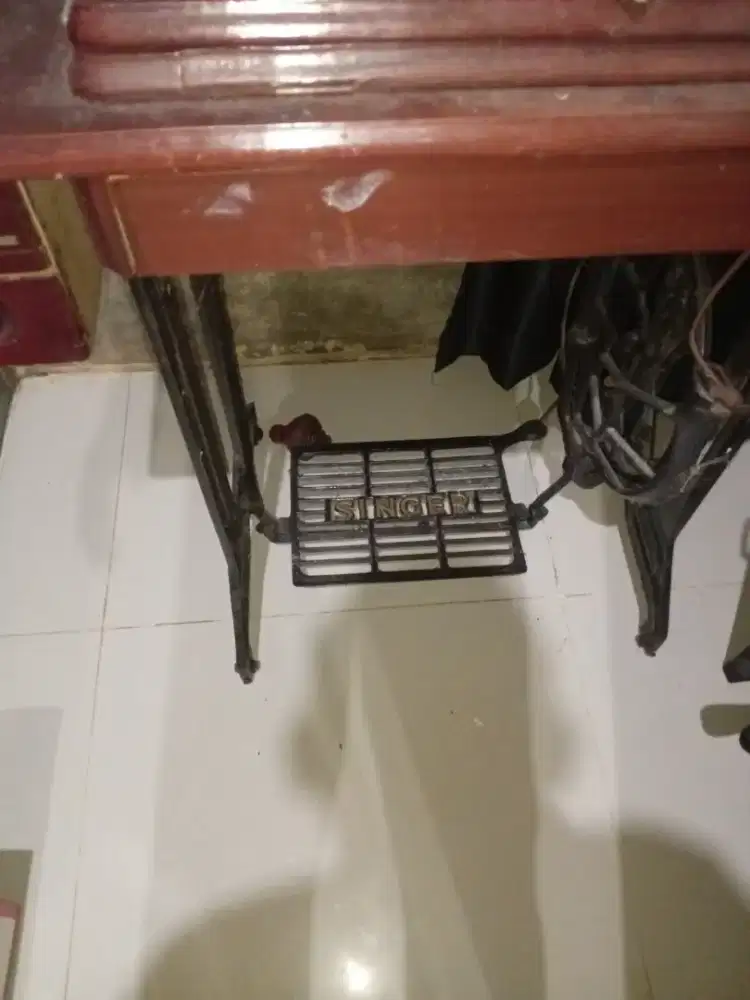 Mesin jahit merek singer