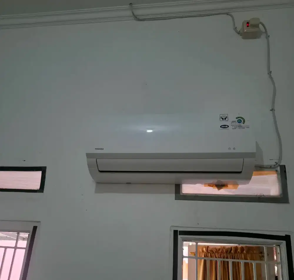 AC 1/2 PK Toshiba bekas