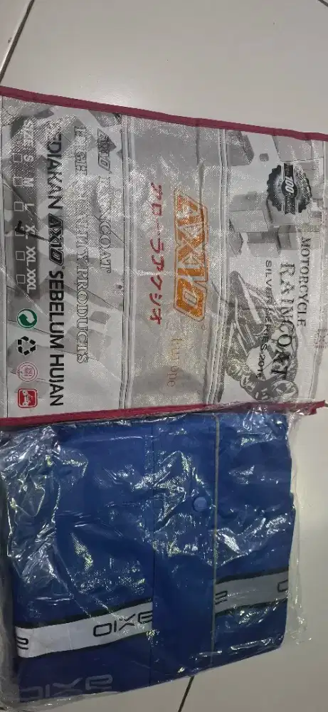 l jas Hujan Axio Kondisi Baru