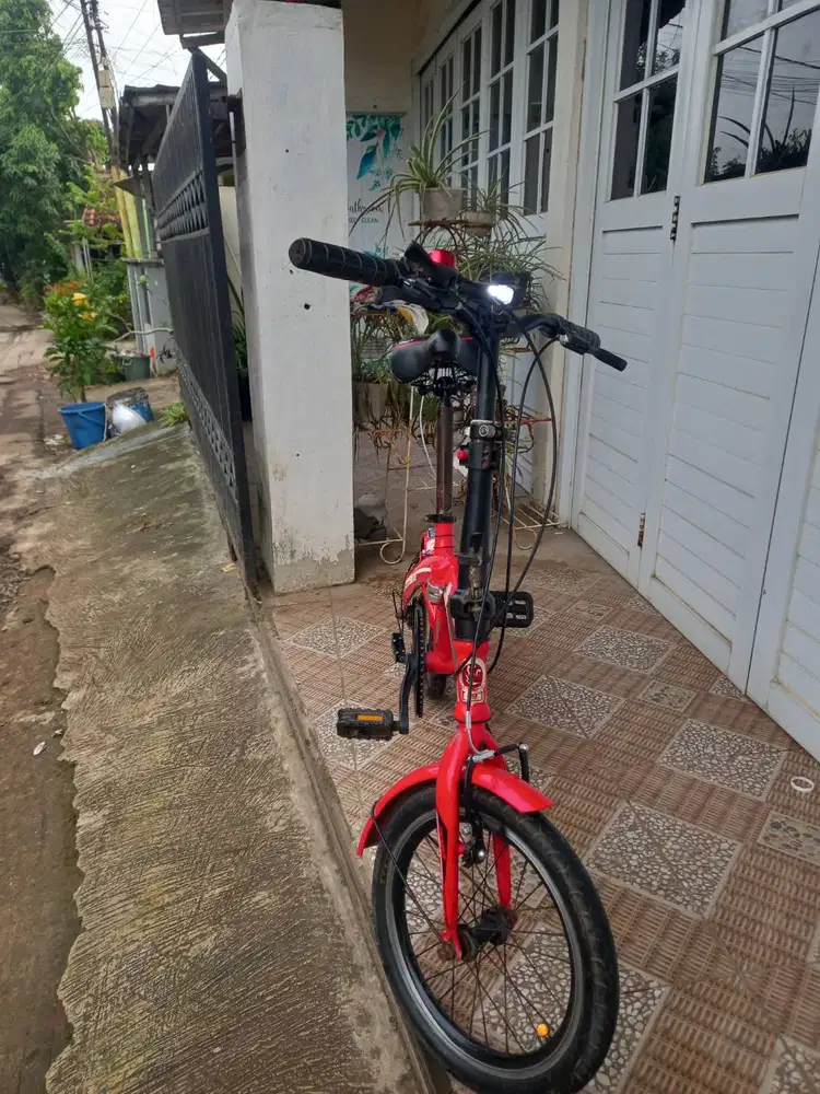 Sepeda Lipat Phoenix SE Merah, sudah assesorggal pakai buat olah