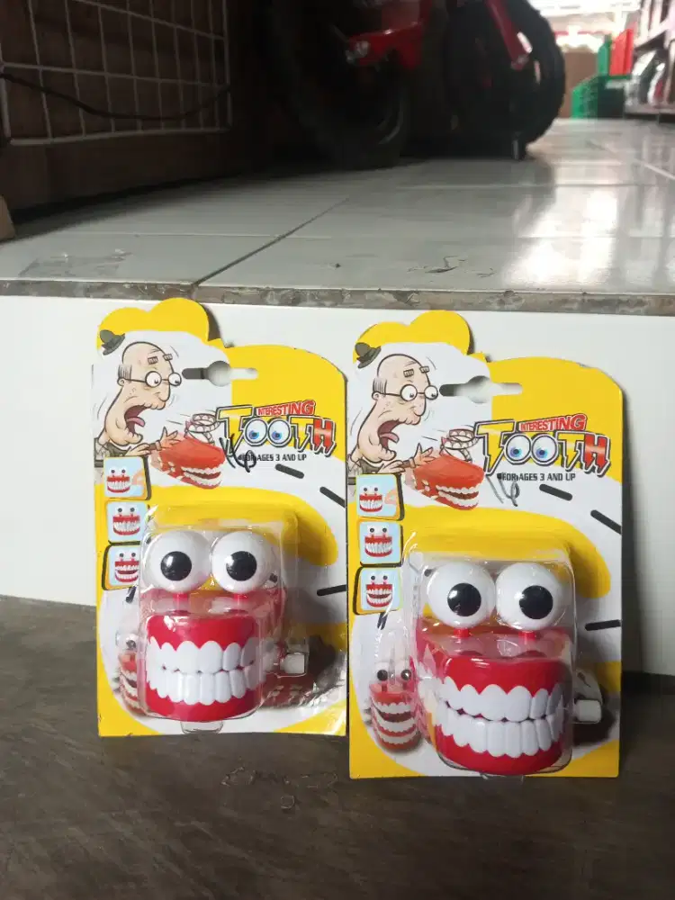Mainan anak tooth gigi putar