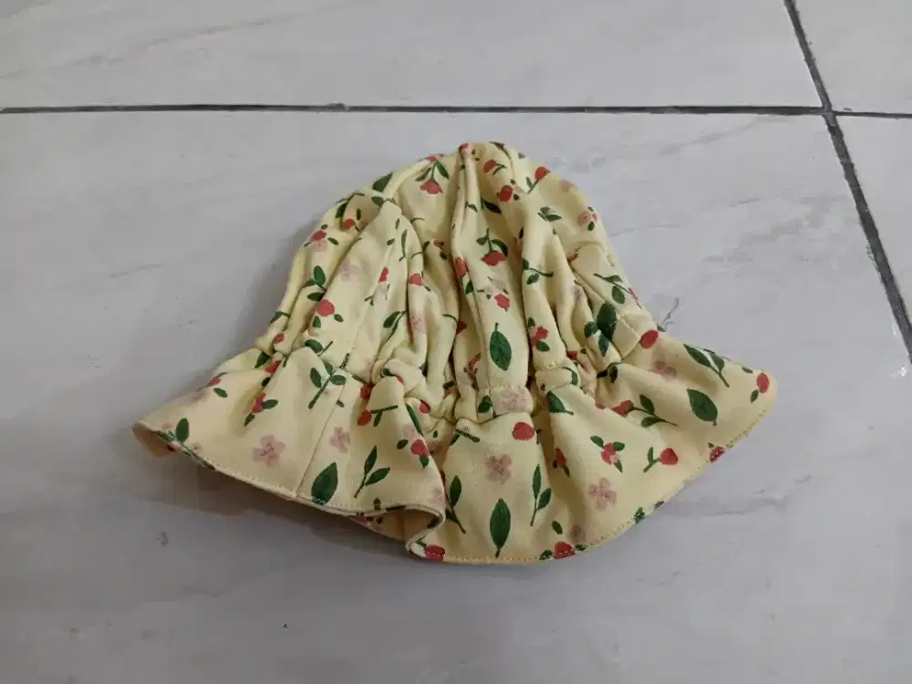 Topi Bonnet Kuning Motif Daun Usia 1 - 2 tahun