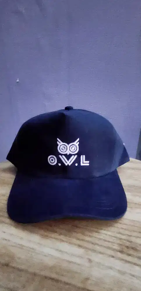 Topi souvenir owl eye wear