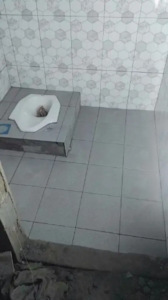 Tukang bangunan tambah kenek