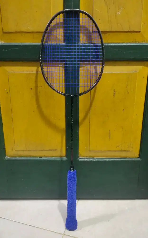 Raket badminton hiqua