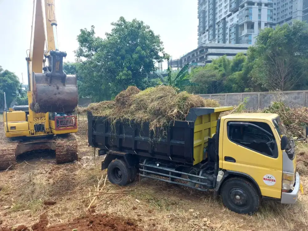 Urug buang puing bangunan urugan tanah merah