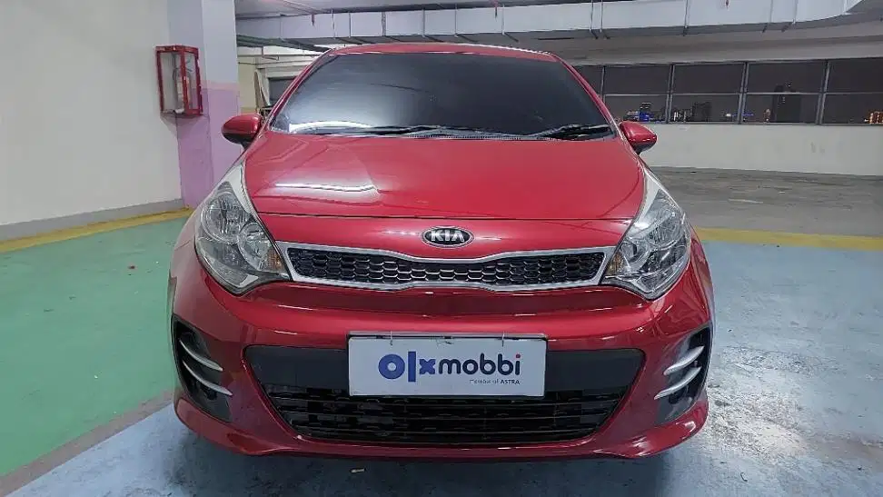 TDP 5,JT, Kia Rio 1.4 Bensin-AT Merah 2012