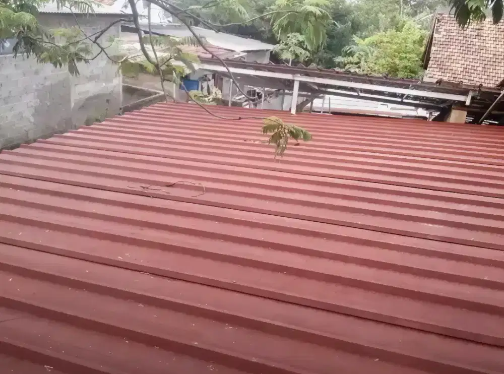 Pasang baja ringan atap spandek