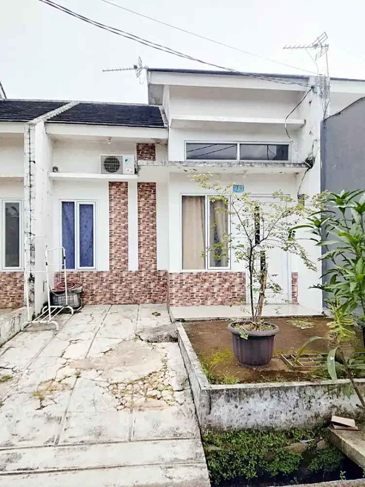 Over kredit rumah cluster