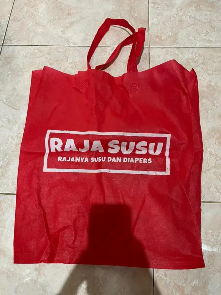 tas merah raja susu
