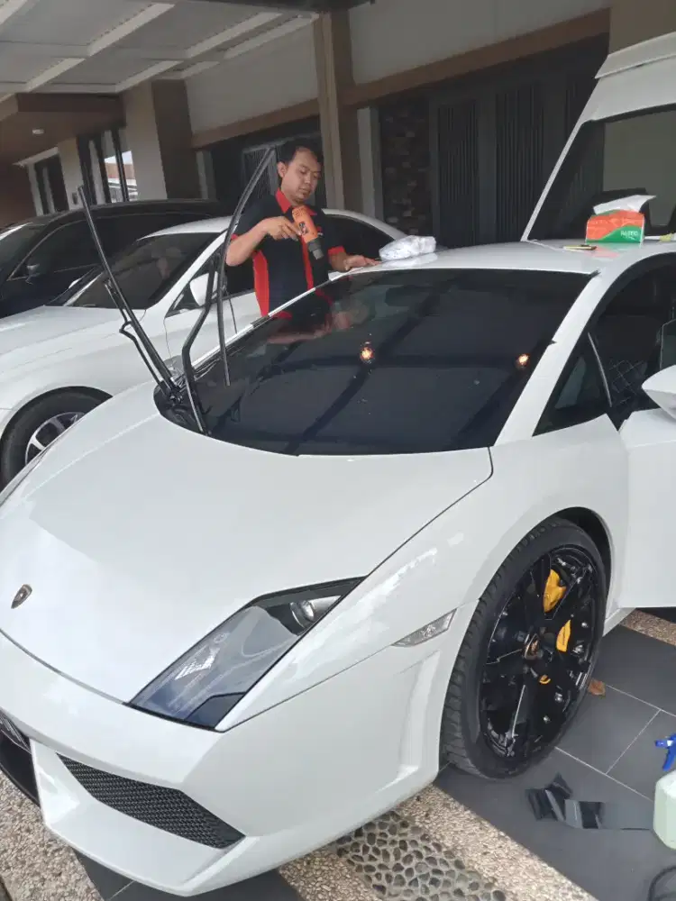 Melayani bongkar pasang kaca film mobil bisa di panggil