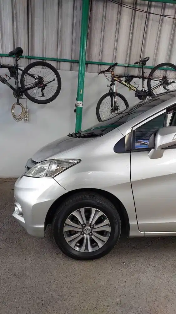 DP  20 JT Honda Freed E PSD AT 2013 AC Double Mulus