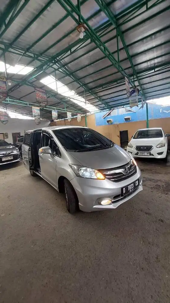 DP  20 JT Honda Freed E PSD AT 2013 AC Double Mulus