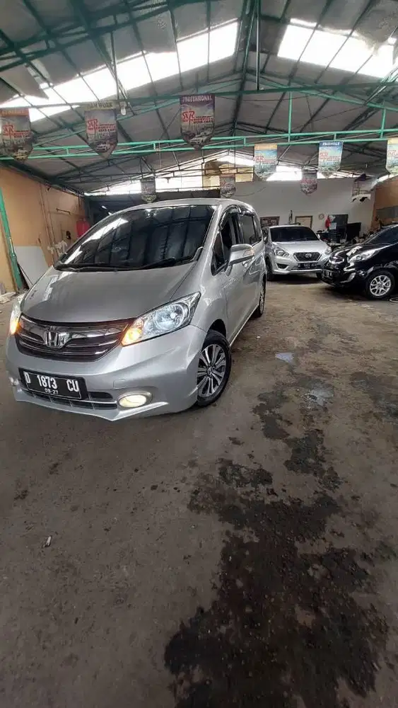 DP  20 JT Honda Freed E PSD AT 2013 AC Double Mulus