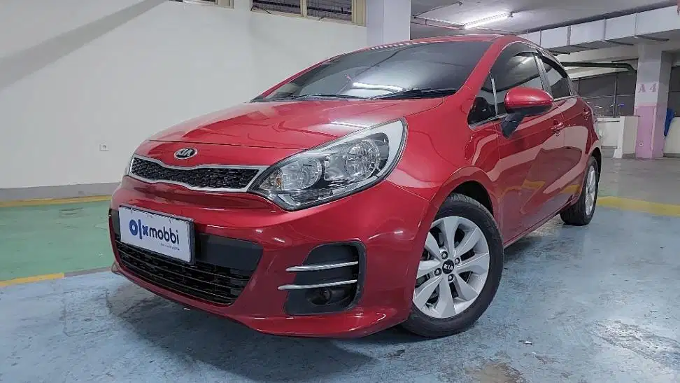 TDP 5,JT, Kia Rio 1.4 Bensin-AT Merah 2012