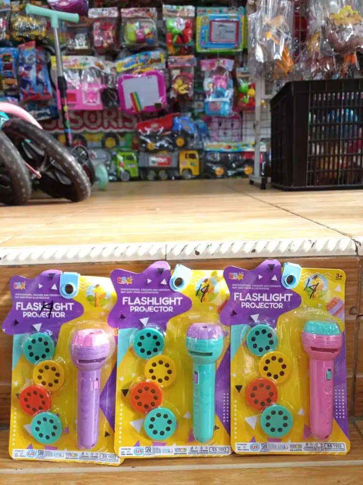 mainan anak senter projector