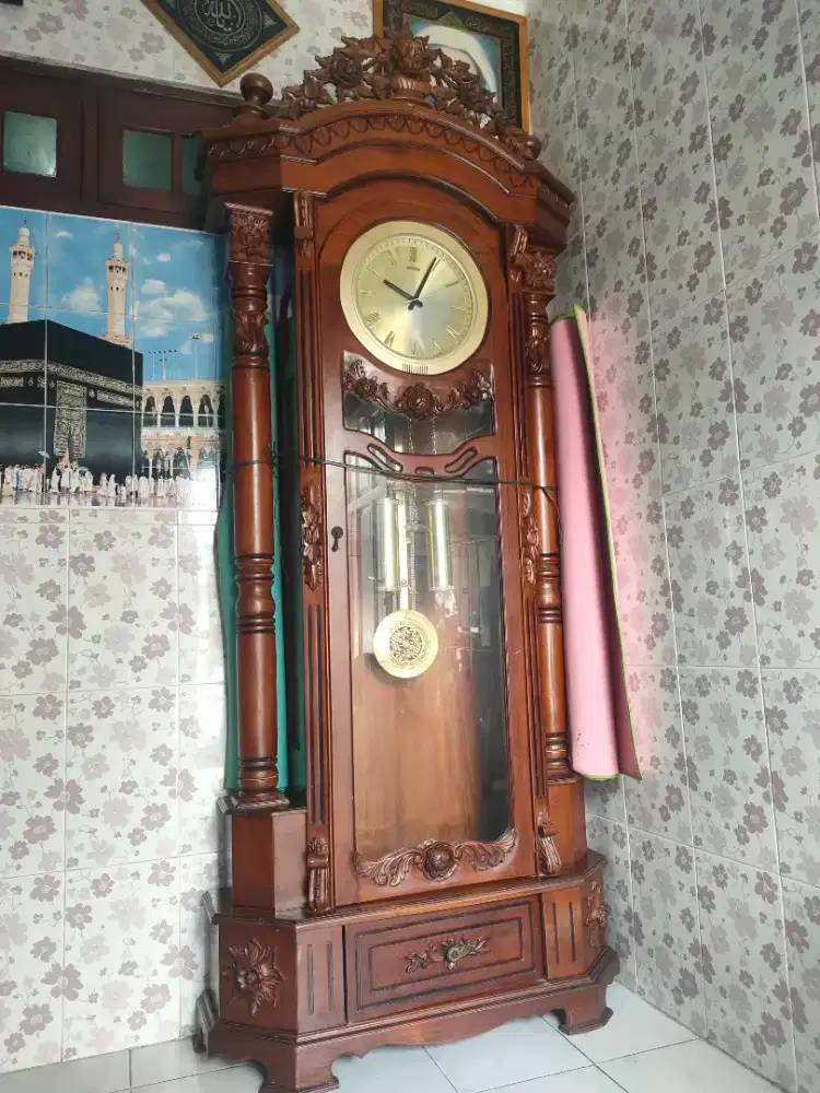 Jam hias jati untuk masjid dan rumah mulus