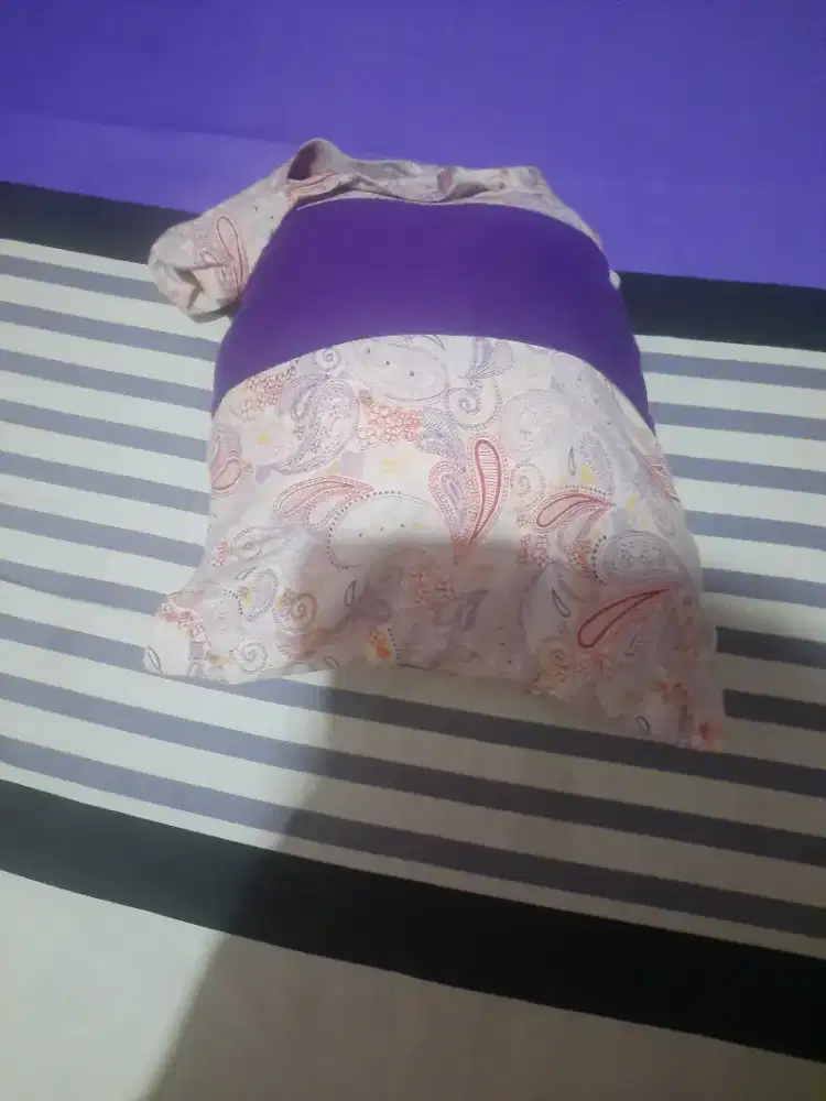 Mukena traveling ungu