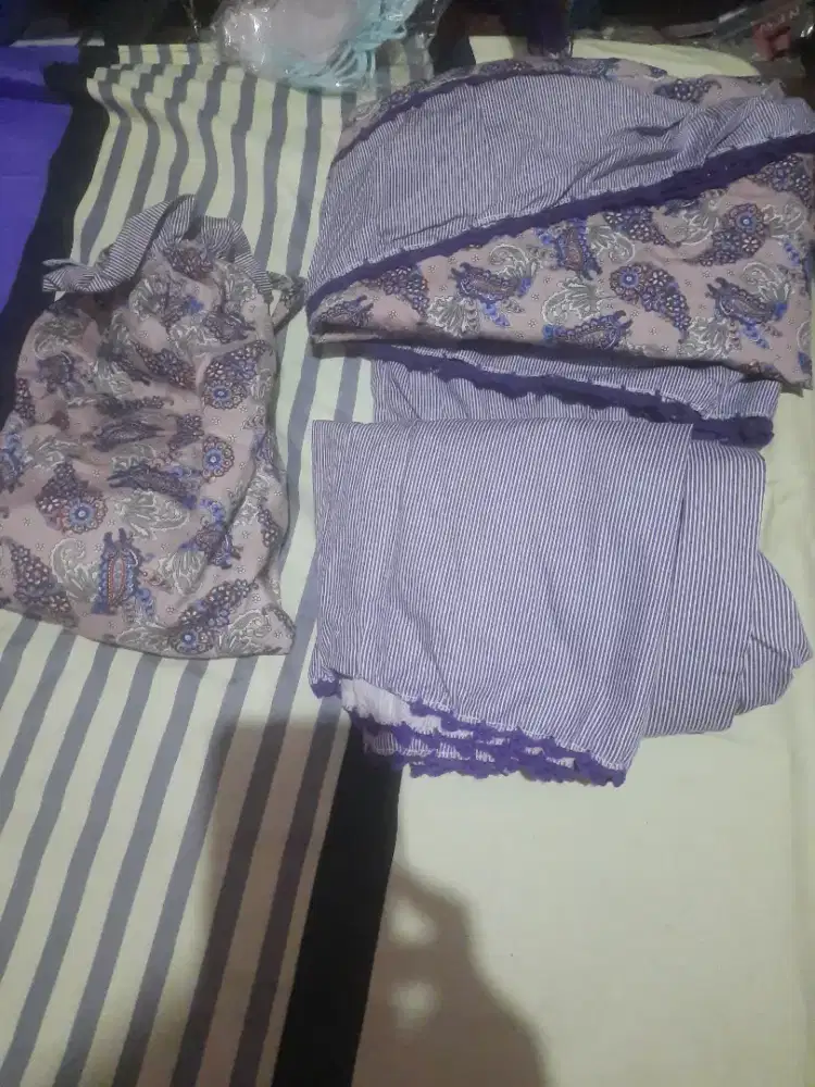 Mukena Traveling motif ungu