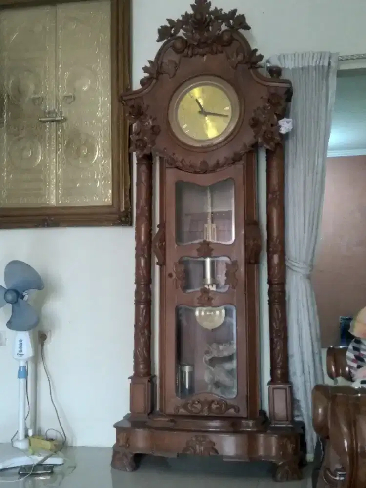 Jam besar ukiran kayu jati jepara