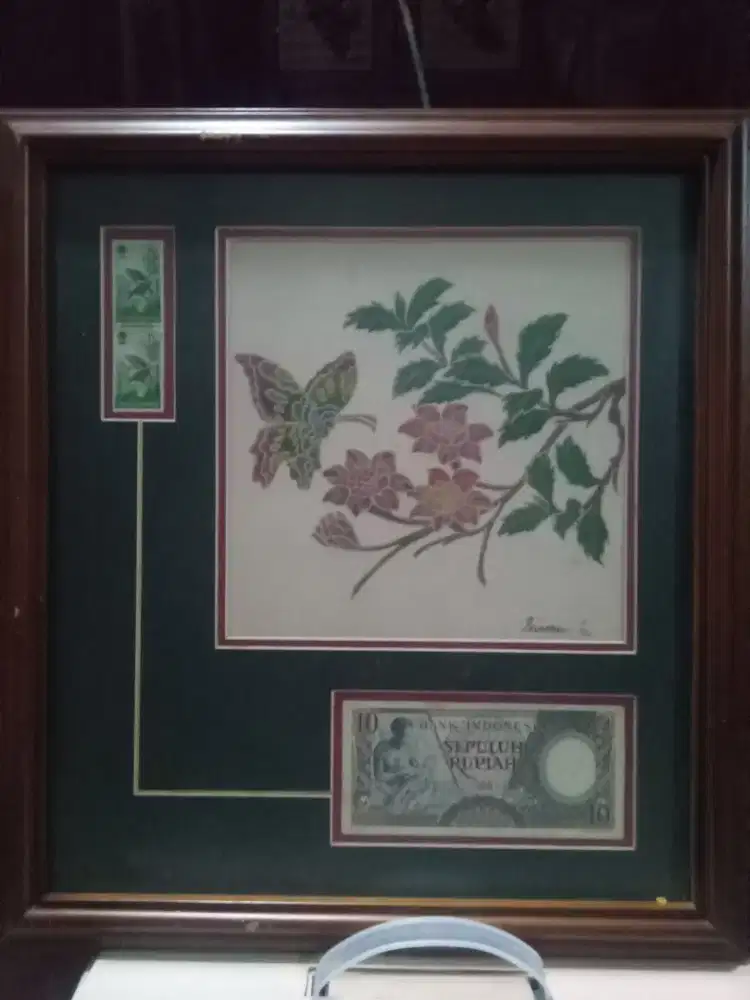 Album koleksi uang kertas dan perangko