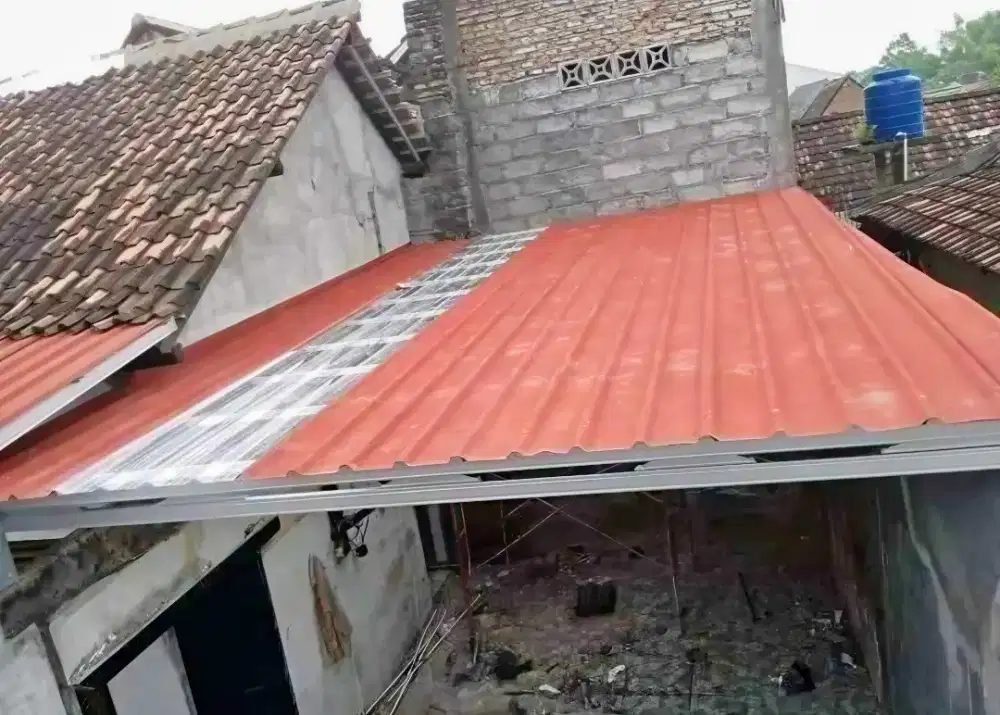 Pasang baja ringan atap spandek pasir