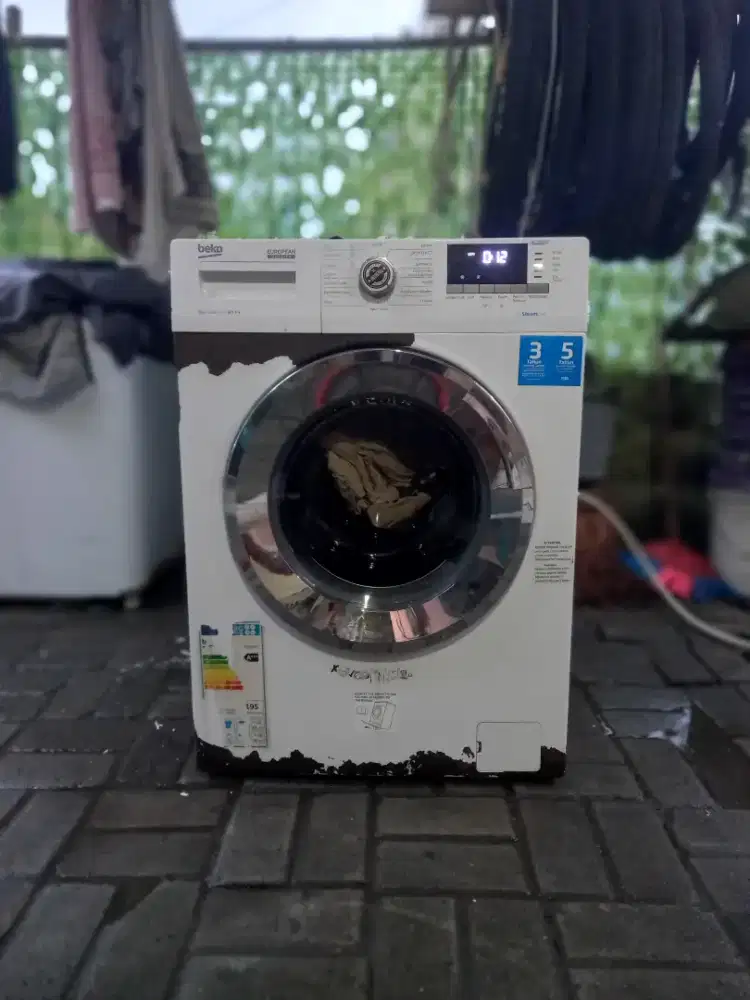 Mesin cuci front loading BEKO WCV8612XOST