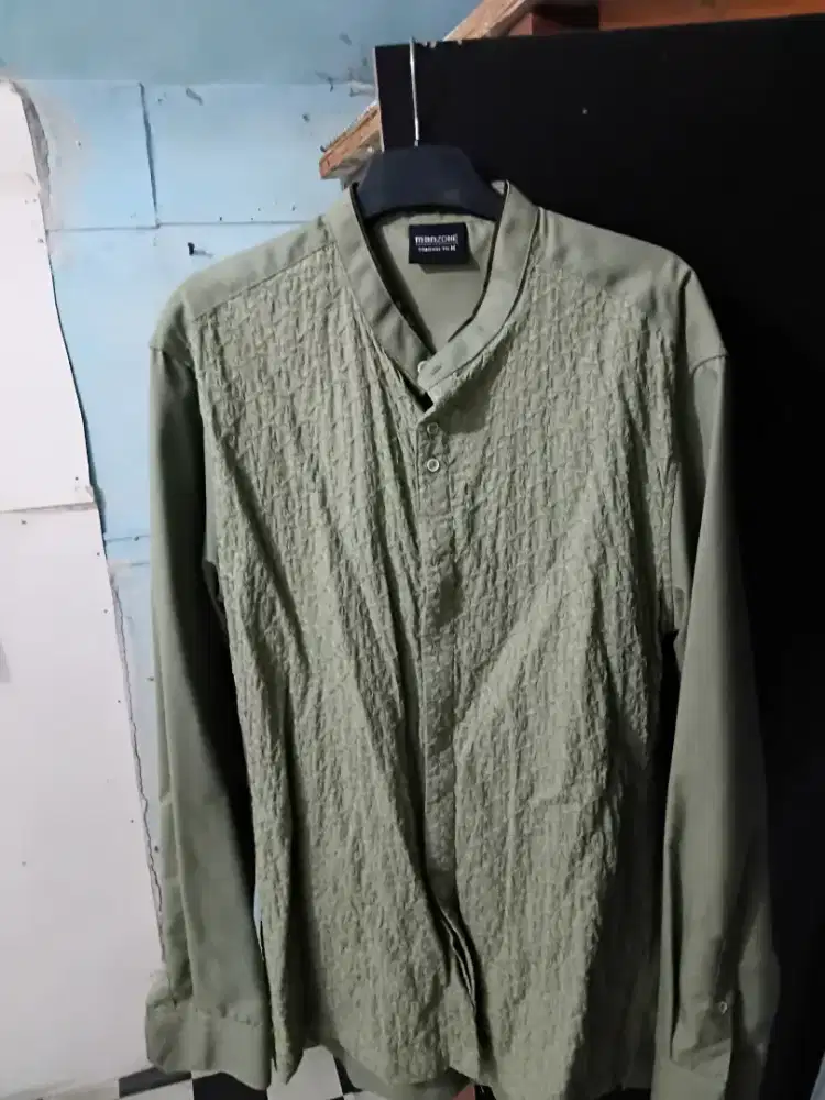 dijual koko manzone,size M/L ,masih bagus bgt lokasi cawang jaktim.
