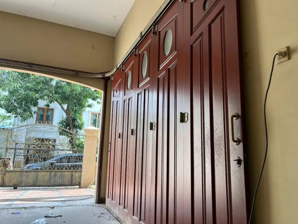 Pintu garasi wina sejahtera