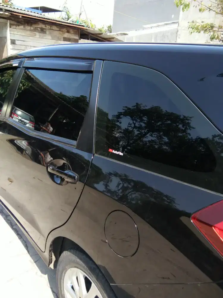 Kaca film mobil dan gedung