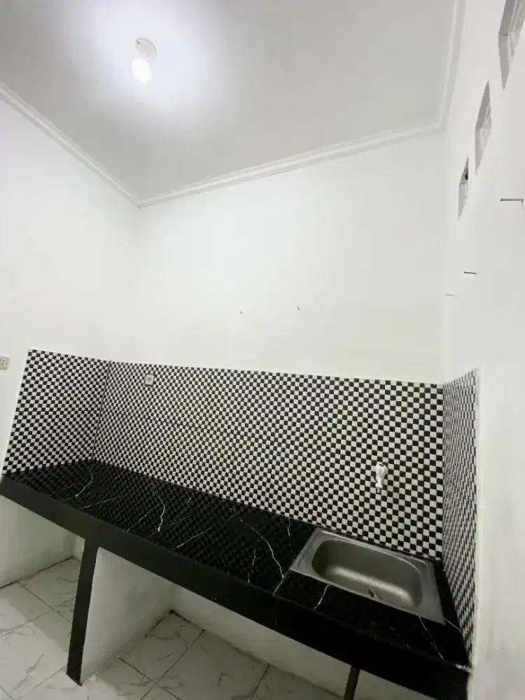 Di kontrakan sebuah rumah minimalis