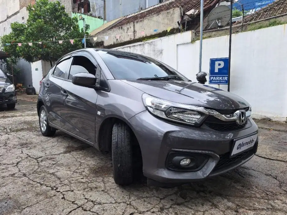 DP MURAH Honda Brio Satya 1.2 E Bensin-AT 2020 Abu-Abu C0VHT
