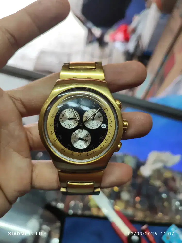 Jam tangan swatch IRONY SWISS MADE V8 GOLD