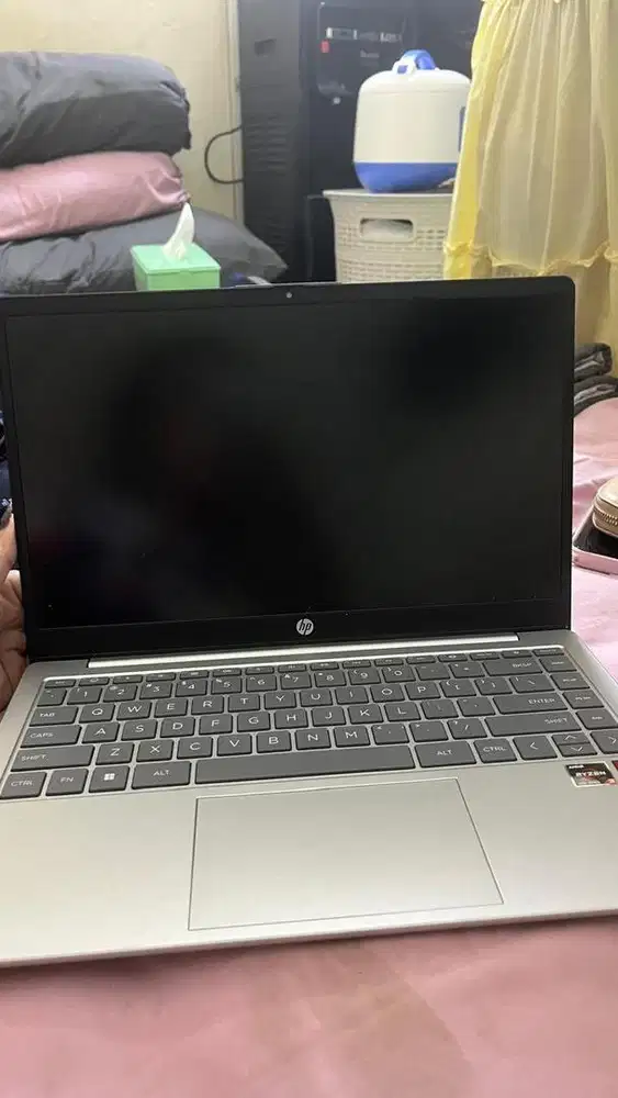 Laptop HP EM0014AU