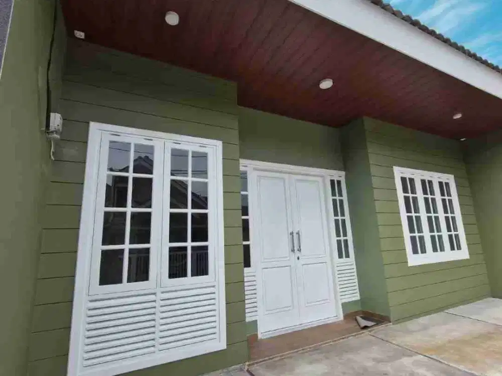 Rumah baru bisa KPR,lingkungan nyaman,3 menit ke Tol BSD & Pasmod.Cocok untuk pasangan muda,carport 2 mobil.Di Griya Loka BSD