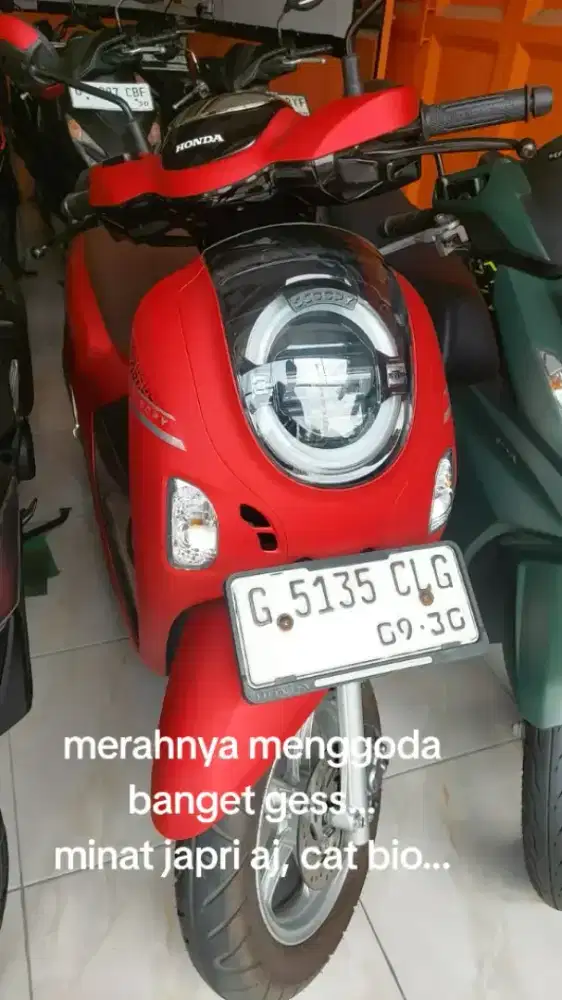 Scopi styliz 2025 merah merona