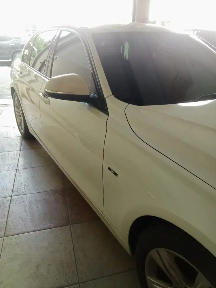 BMW 120i 2012 Bensin