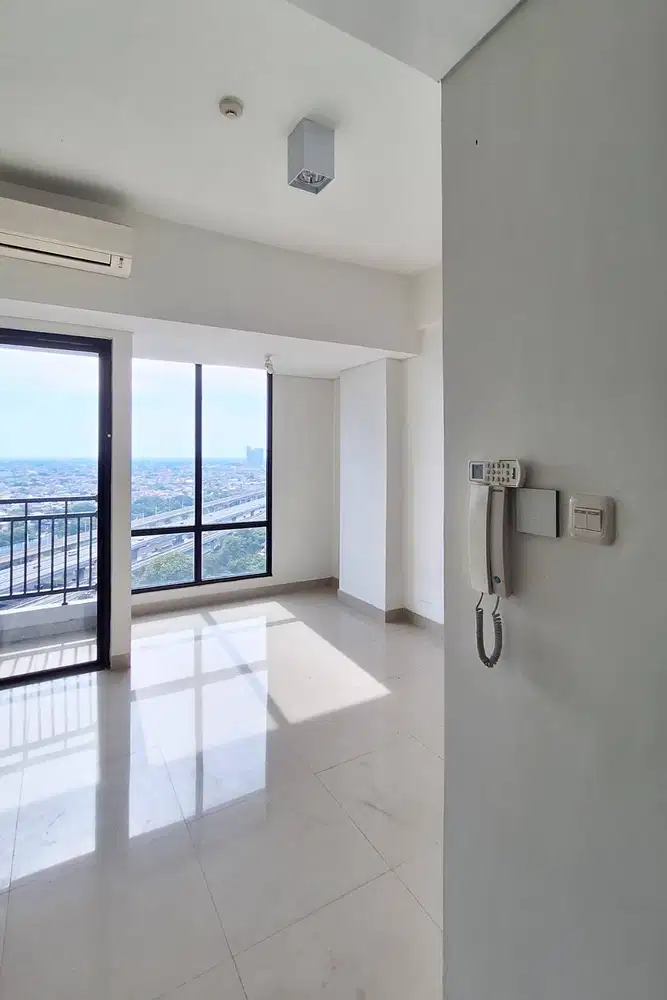 Apartemen Studio Unfurnished Dekat Stasiun LRT – Murah & Strategis