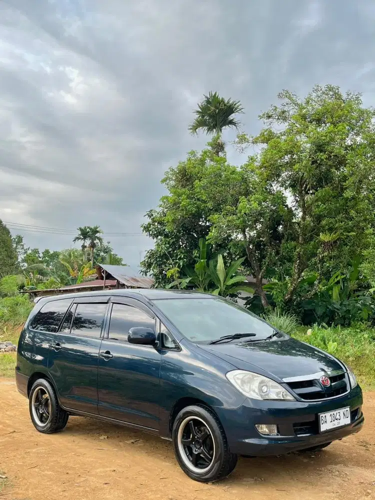 Inova E bensin manual 2.0 tahun 2005 ganteng