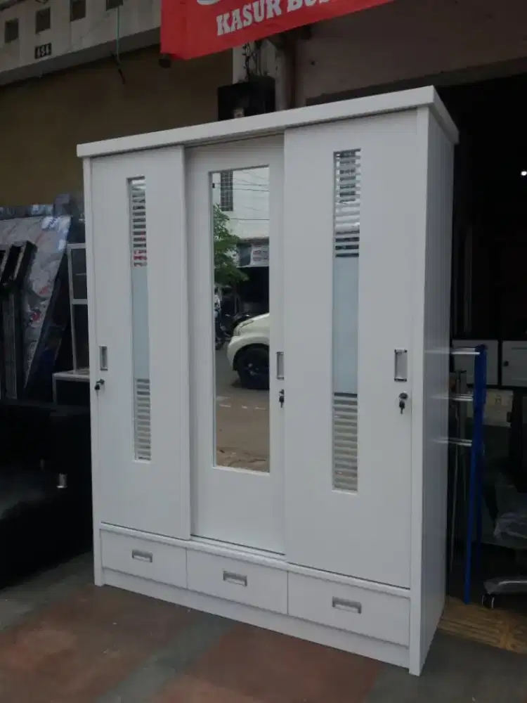 LEMARI BAHAN TRIBLOK 3 PINTU SLIDING