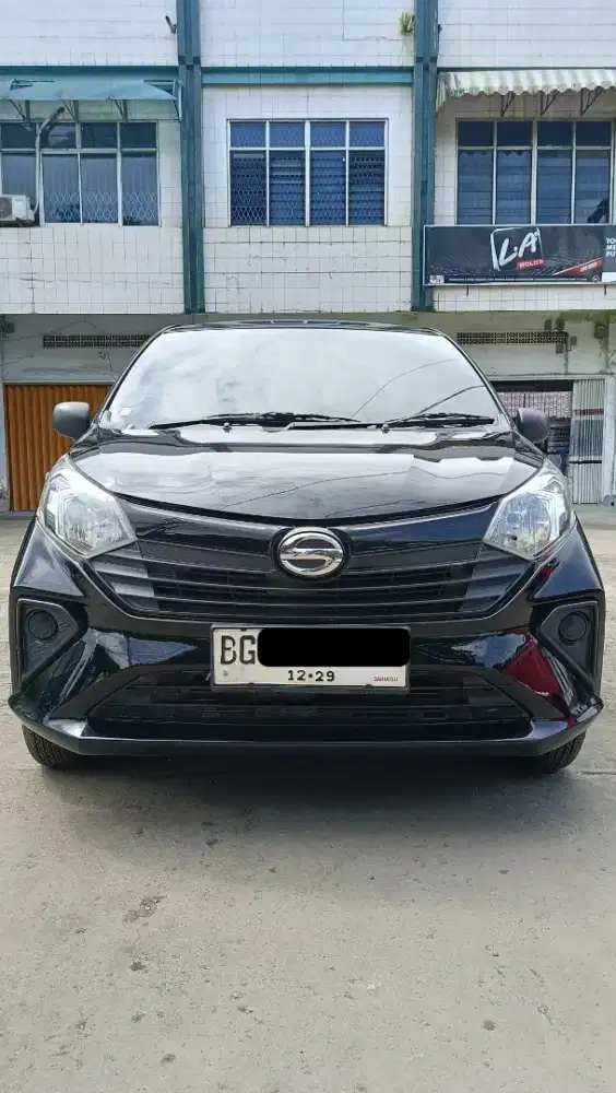 Sigra 1.0 D manual 2024
