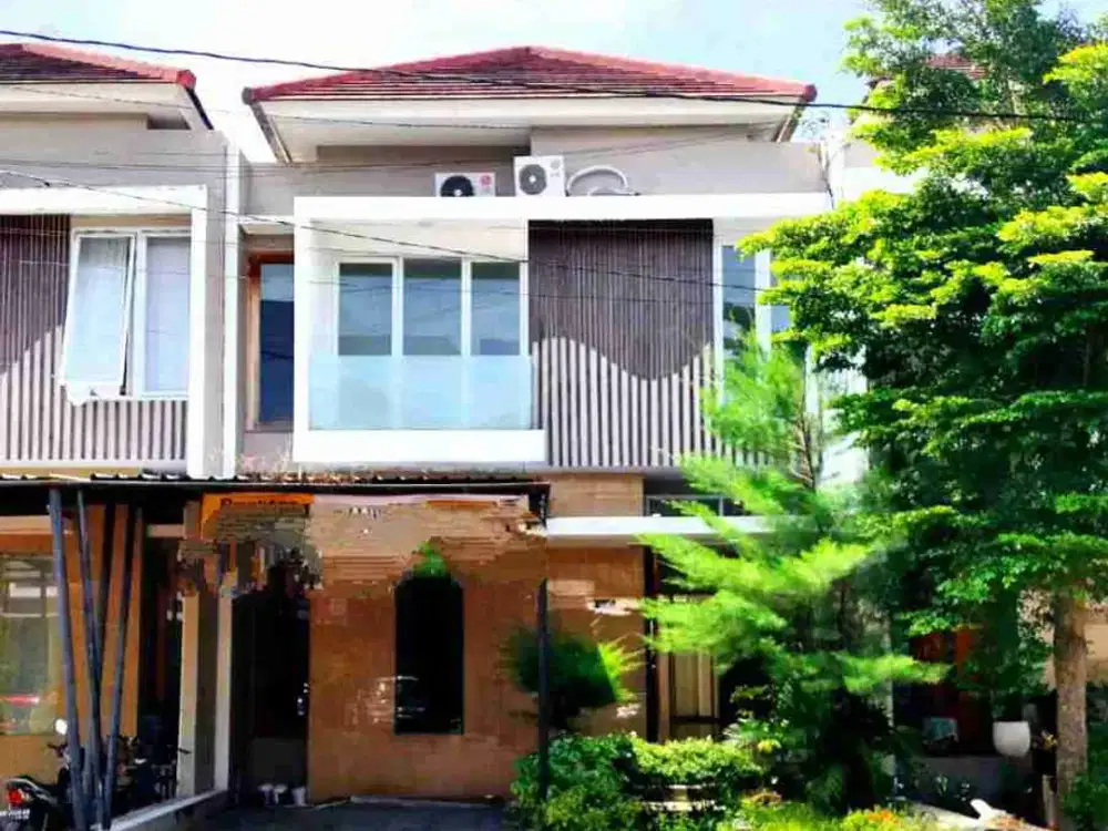 rumah cantik di cluster taman Anggrek Gentan harga menarik