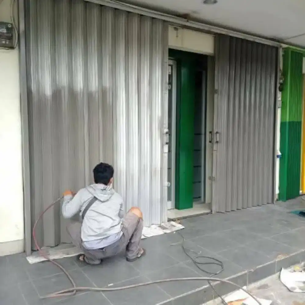 Jasa service rolling door