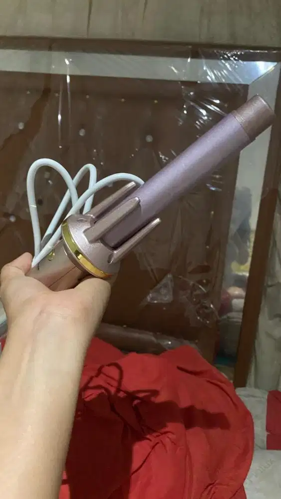 Alat untuk mengkriting rambut