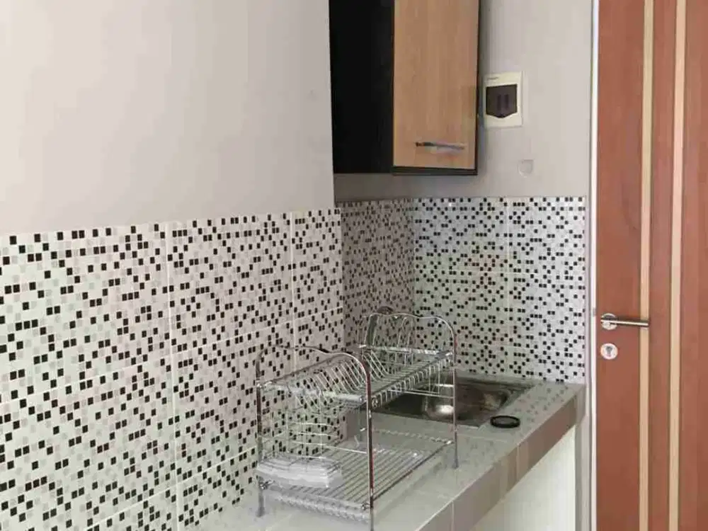 Sewa Apartemen Puncak Dharmahusada 1 Bedroom Studio